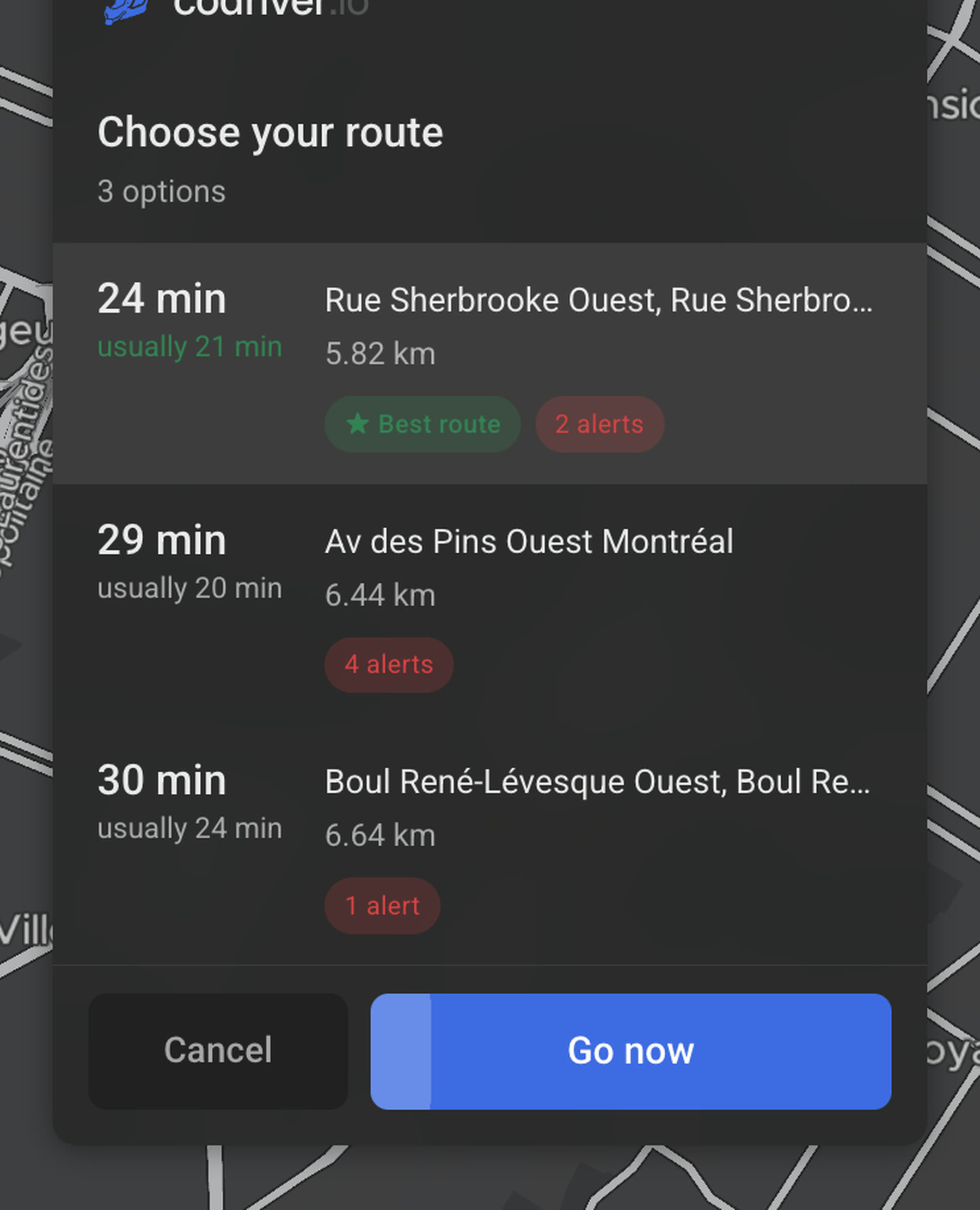 The codriver route picker on a Tesla screen: each alternative with its time, its usual time, its distance and how many alerts are on it, the quickest already selected, and a Go button that counts itself down.