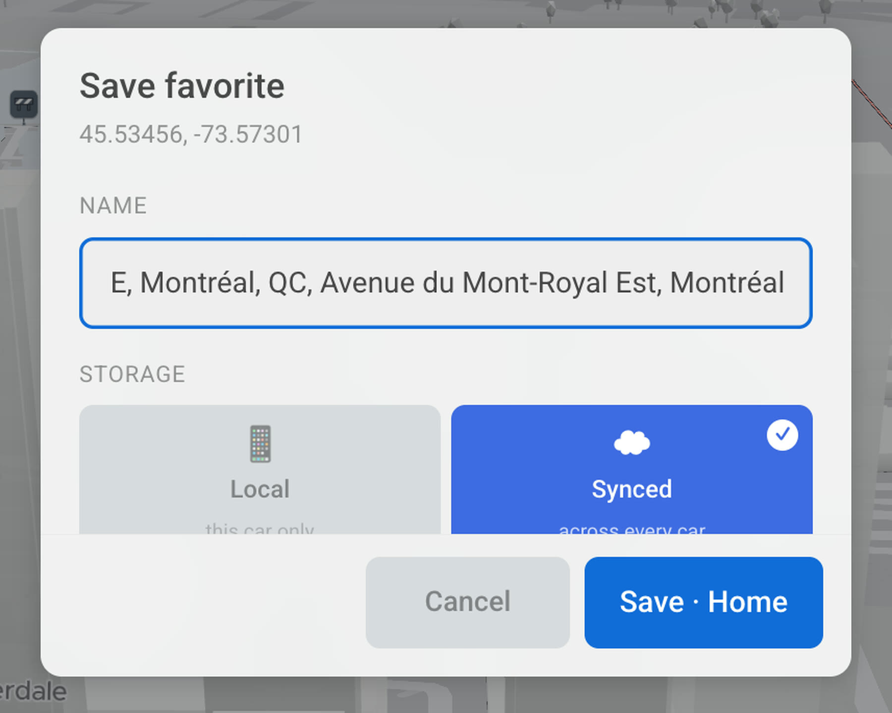 The save-favourite sheet on a Tesla screen: the name already filled in from the address, and a choice between keeping it on this car or syncing it across every car.
